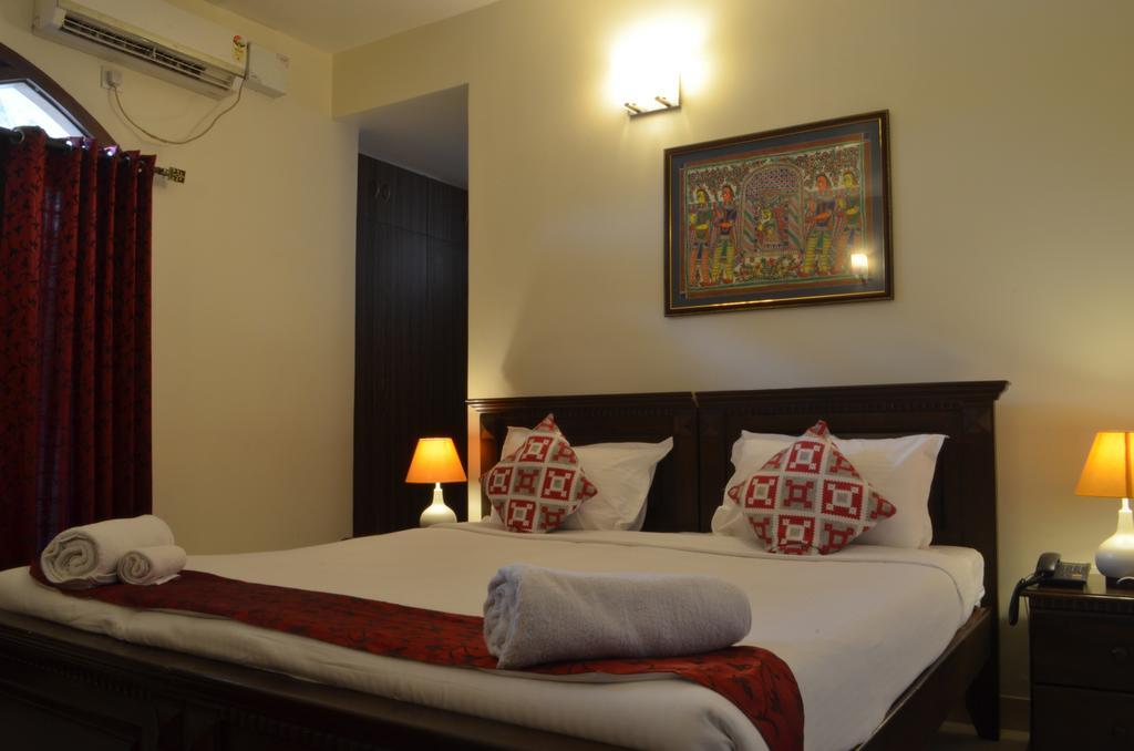 Luxtay Suites Bangalore Værelse billede