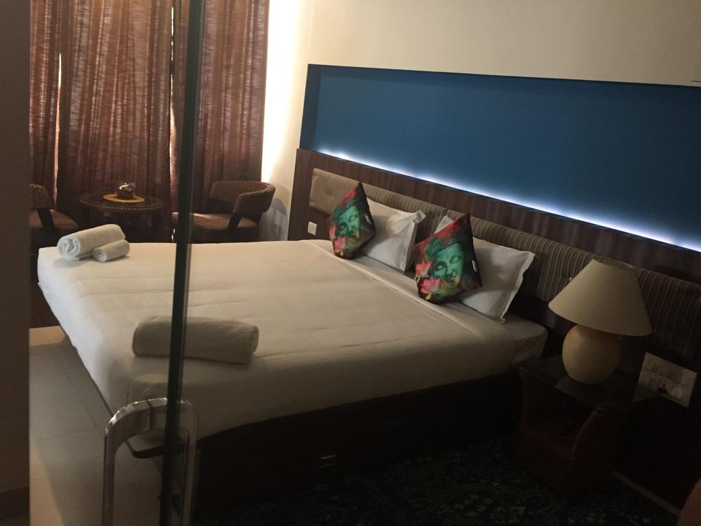 Luxtay Suites Bangalore Værelse billede