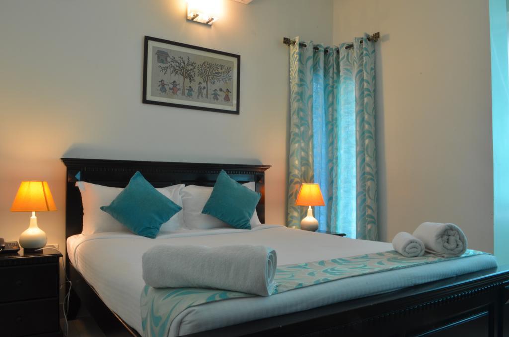 Luxtay Suites Bangalore Værelse billede
