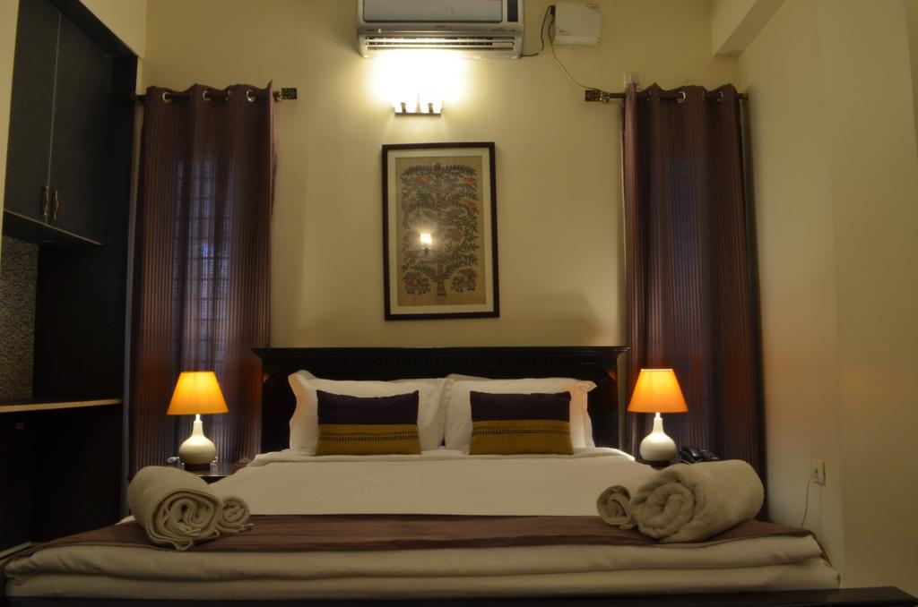 Luxtay Suites Bangalore Værelse billede