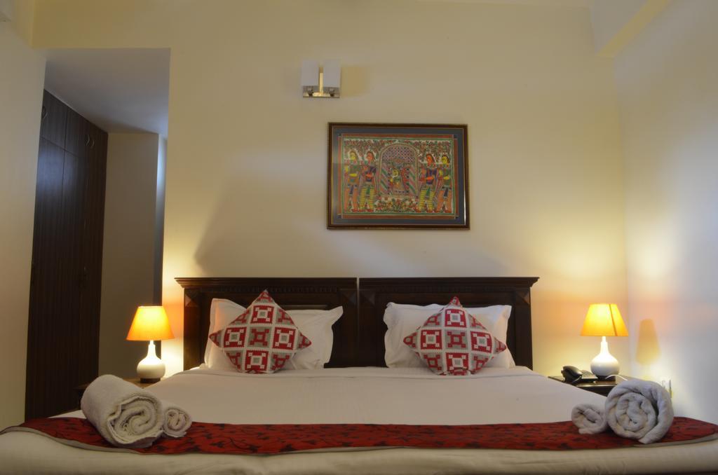 Luxtay Suites Bangalore Værelse billede